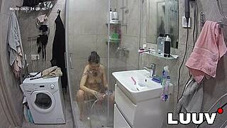 beautiful alice shaves intimately for reality show shower cameras