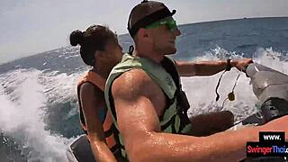asian girlfriend sneaks blowjob thrill on public jetski ride with boyfriend under sun