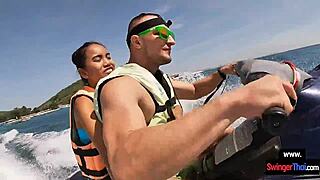 asian girlfriend sneaks blowjob thrill on public jetski ride with boyfriend under sun