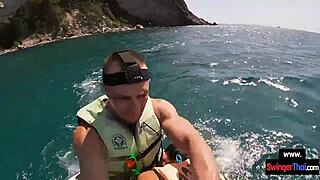 asian girlfriend sneaks blowjob thrill on public jetski ride with boyfriend under sun