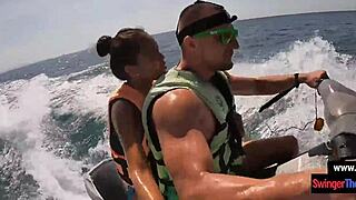 asian girlfriend sneaks blowjob thrill on public jetski ride with boyfriend under sun