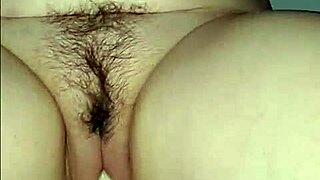 Handcuffed wife squirts cream over dildo wildly