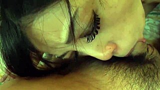 i love how this japan teen rubs that dick all over her big tits before sucking cum