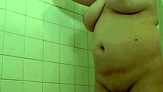 Dominant woman's naked shower seduction intensifies slowly