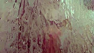 Dominant woman's naked shower seduction intensifies slowly