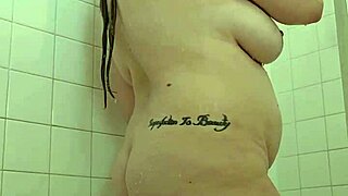 Dominant woman's naked shower seduction intensifies slowly