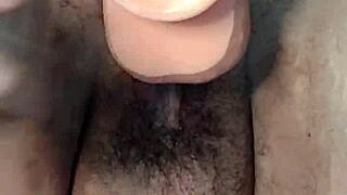 fat hairy pussy stretched wide in closeup fisting