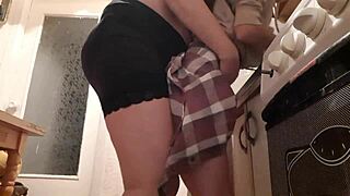 brunette milf in miniskirt moans hard during kitchen fuck and orgasm