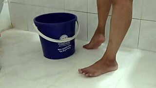 Home maid bends over exposing ass and pussy while cleaning floor seductively