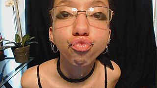 cutie goth teen spits drool on nude lipstick teasing wet tongue