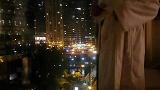 Petite babe fingers clit to orgasm outside hotel window