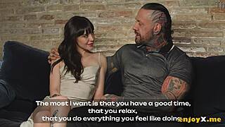 Tattooed brunette rides hard cock