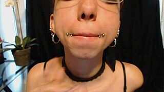 cutie goth teen spits drool on nude lipstick teasing wet tongue