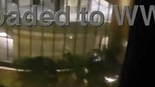 Petite babe fingers clit to orgasm outside hotel window