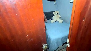 I sneaked a peek at this sexy latina fresh from the shower rubbing lotion everywhere before fingering her pussy to orgasm