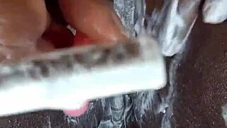 Black milf shaves smooth pussy then masturbates to wet orgasm close-up