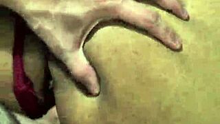 Her intense brown eyes captivate as she shows off huge tits