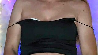 TRANSSEXUAL CROSSDRESSER STROKES HER THROBBING COCK IN SEXY OUTFIT