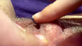 extreme closeup on throbbing big clit pulsing through intense orgasm