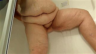 big boobed bbw maid flashes juicy ass and pussy in shower closeup