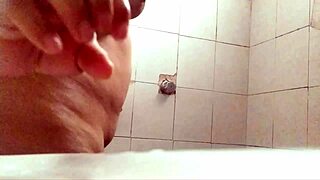 Busty curvy milf showers for voyeur thrills! 🛁🔥👀