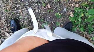 Three friends chill in swimsuit shorts outdoors