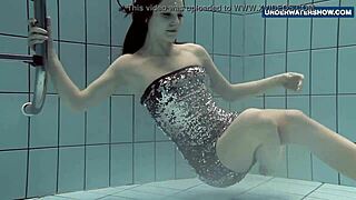 She FLASHES bright tits underwater driving everyone wild