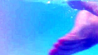 Milf melissa dives into pool with tattoos