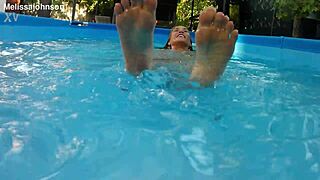 Milf melissa dives into pool with tattoos