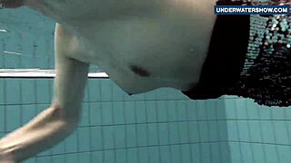 She FLASHES bright tits underwater driving everyone wild