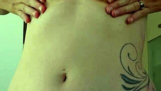 Rubbing creamy sun lotion over heaving tits during risky public beach exposure