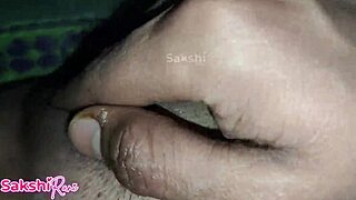 Young woman prepares for intimate moment with fingering