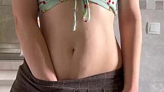 cute petite teen strips teases and fingers shaved pussy to orgasm