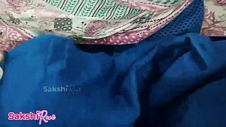 Young woman prepares for intimate moment with fingering