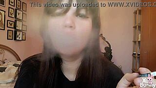 Romanian femdom goddess smokes cigarette showing big bare pussy lips up close