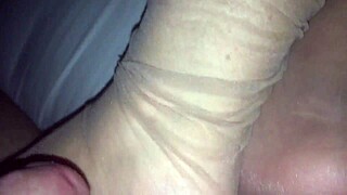 wife strokes cock through sheer nylon socks teasingly