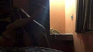 Brunette babe hooks up with black stud in hotel room