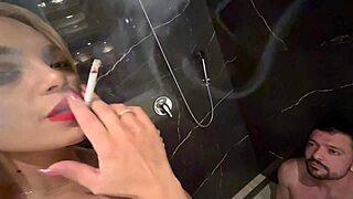 as i puff on my cigarette i unleash hot piss all over my bound slave's tight pussy