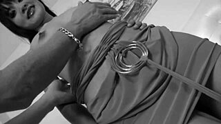 Asian teen sugar bends over in fishnets for deep anal fingering and machine pounding on shaved pussy