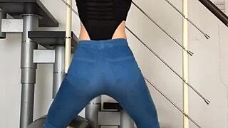 chinese dancer grooves seductively in tight jeans to music