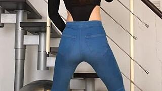chinese dancer grooves seductively in tight jeans to music