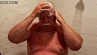 Mature Man Flaunts Sexy Shower for Peeping Neighbors!