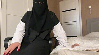 check out this hijab milf teasing her pantyhose curves