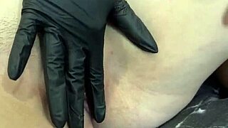 Sexy babes in gloves and fishnets tease each other with fingering play