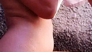 Risky backyard bath spied by neighbor leads to wild pounding