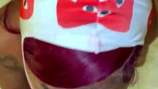 masked figure delivers intense deep throat action