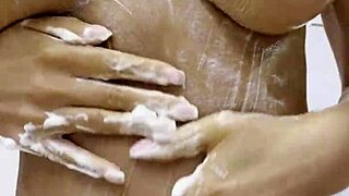 monika fox tempts naked at home smearing cream over big tits and ass
