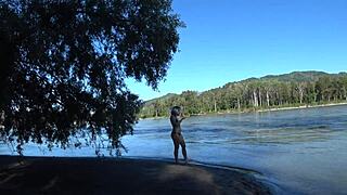 Spying slim blonde milf pisses hairy pussy outdoors publicly