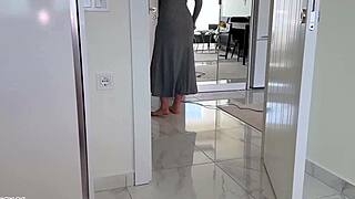 Hot brunette shakes huge ass in thong dress