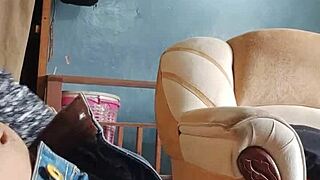 he strokes his throbbing cock alone in the living room shadows